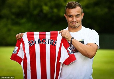 2B46D95600000578-3193949-Xherdan_Shaqiri_shows_off_his_new_Stoke_shirt_after_joining_the_-m-1_1439367436901