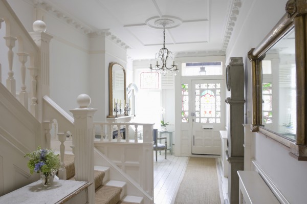 Front door with entrance hall of house