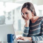 Busy woman working with her laptop