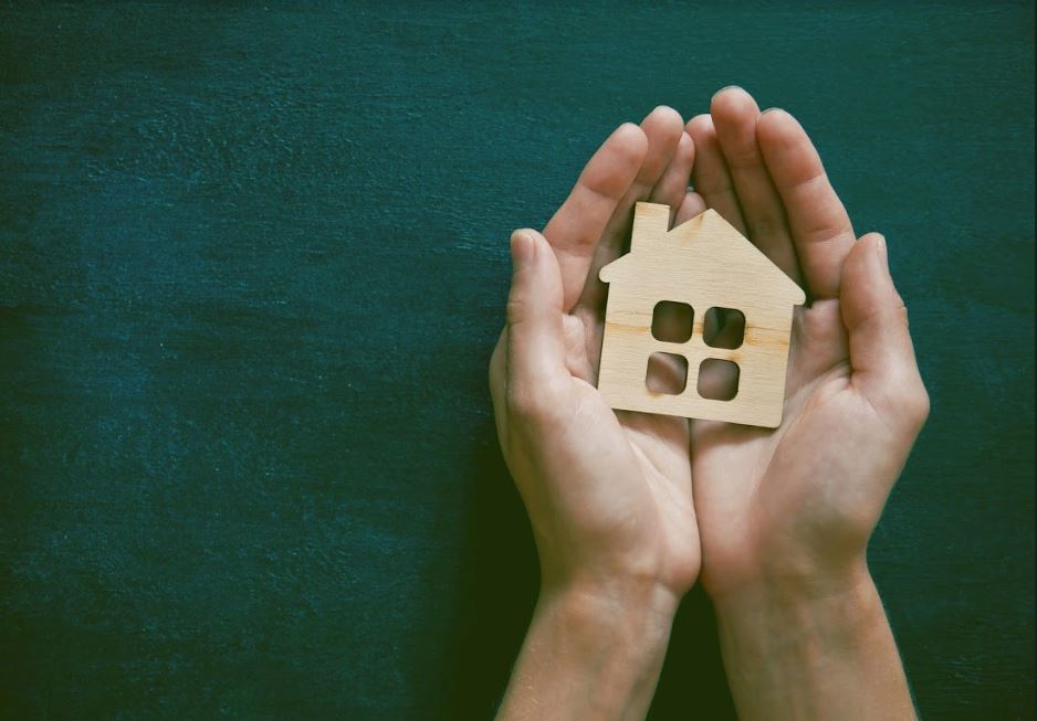 house and hands image