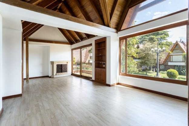 Living room and dining room of a nicely furnished rental