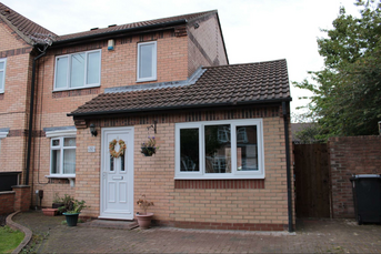 Example of an attached garage with a pitched roof